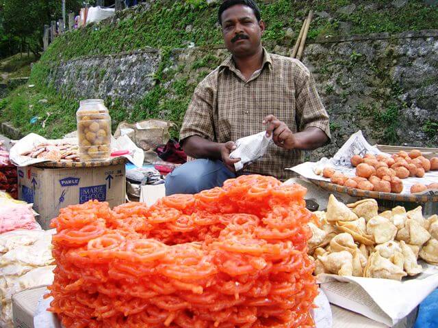 Indian Sweets Salesman - Roadside hawker selling jalebis in West Sikkim
